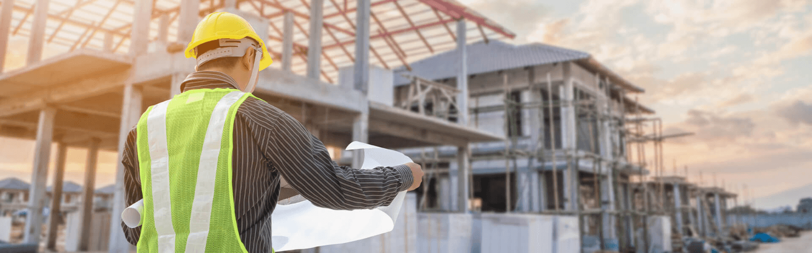 builder looking at villa blueprint ibiza