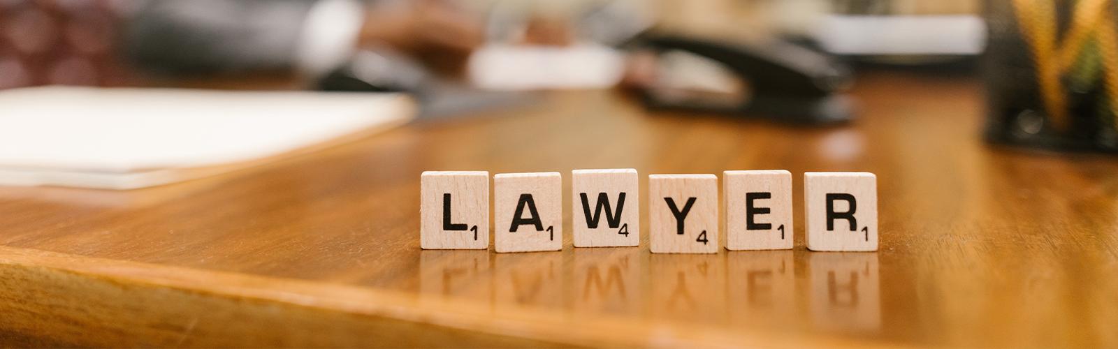 Lawyer text shown through different letter blocks